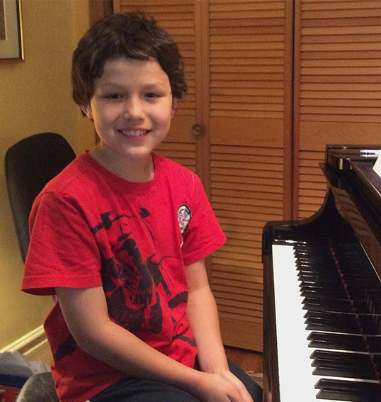 Boy At Piano